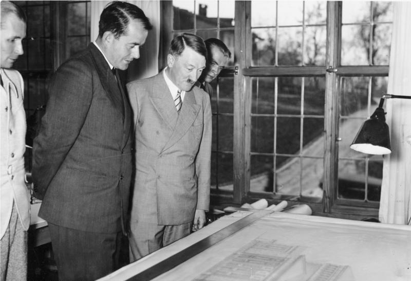 Adolf Hitler and Albert Speer inspect the plans for the new Linz opera in Speer's atelier